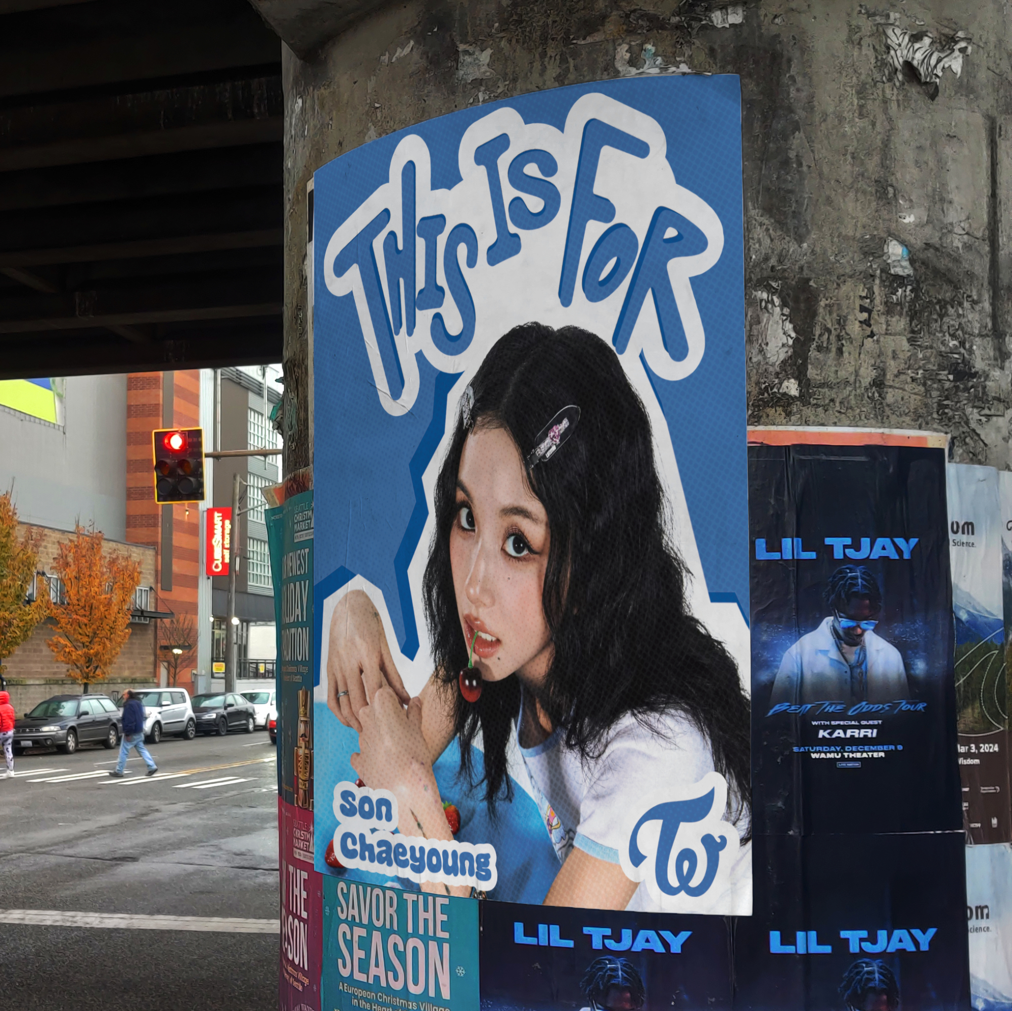 Album poster displayed on a city advertising column